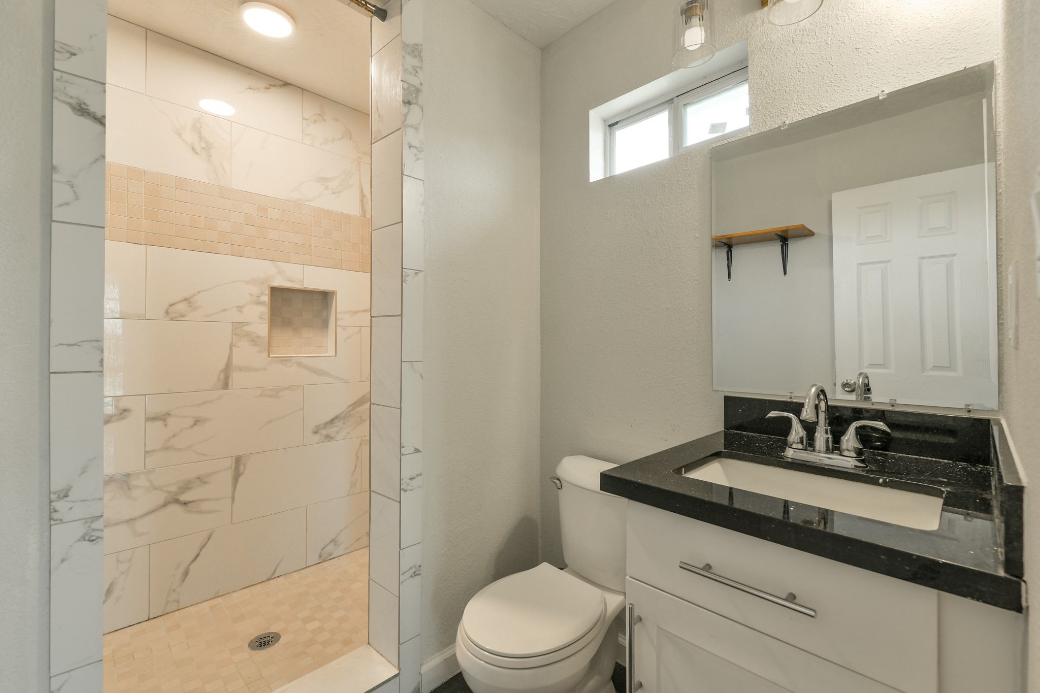 1210 Airline North Rosharon, TX 77583 - Photo 18 of 19 a bathroom with a sink a toilet a mirror and shower