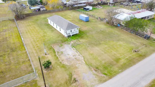 a view of swimming pool with a yard