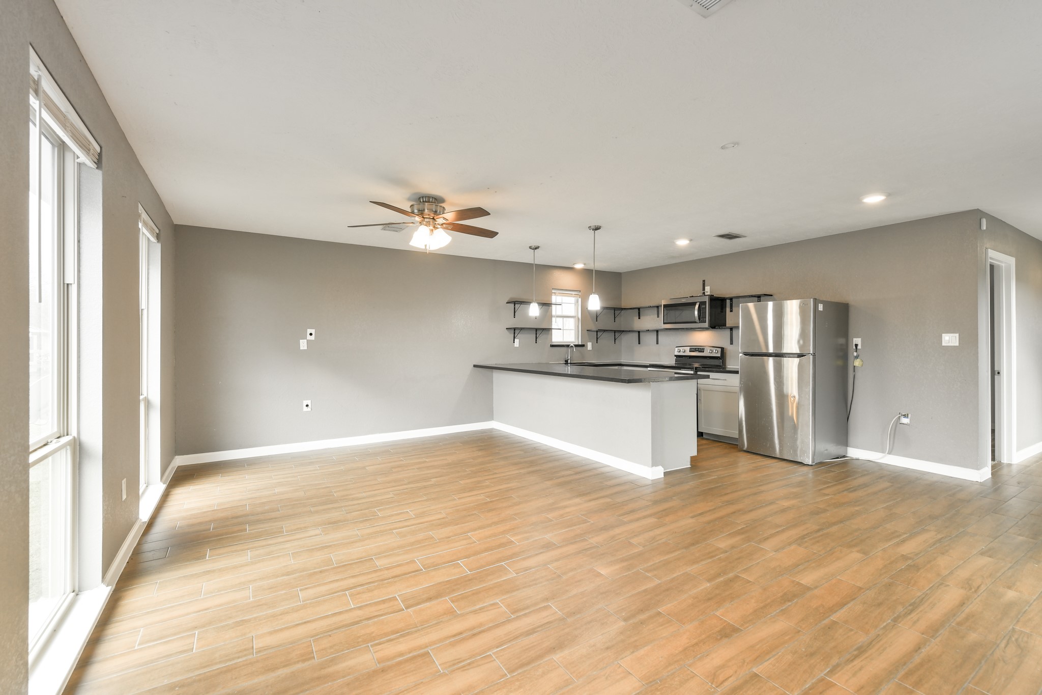 1210 Airline North Rosharon, TX 77583 - Photo 9 of 19 a view of kitchen with wooden floor