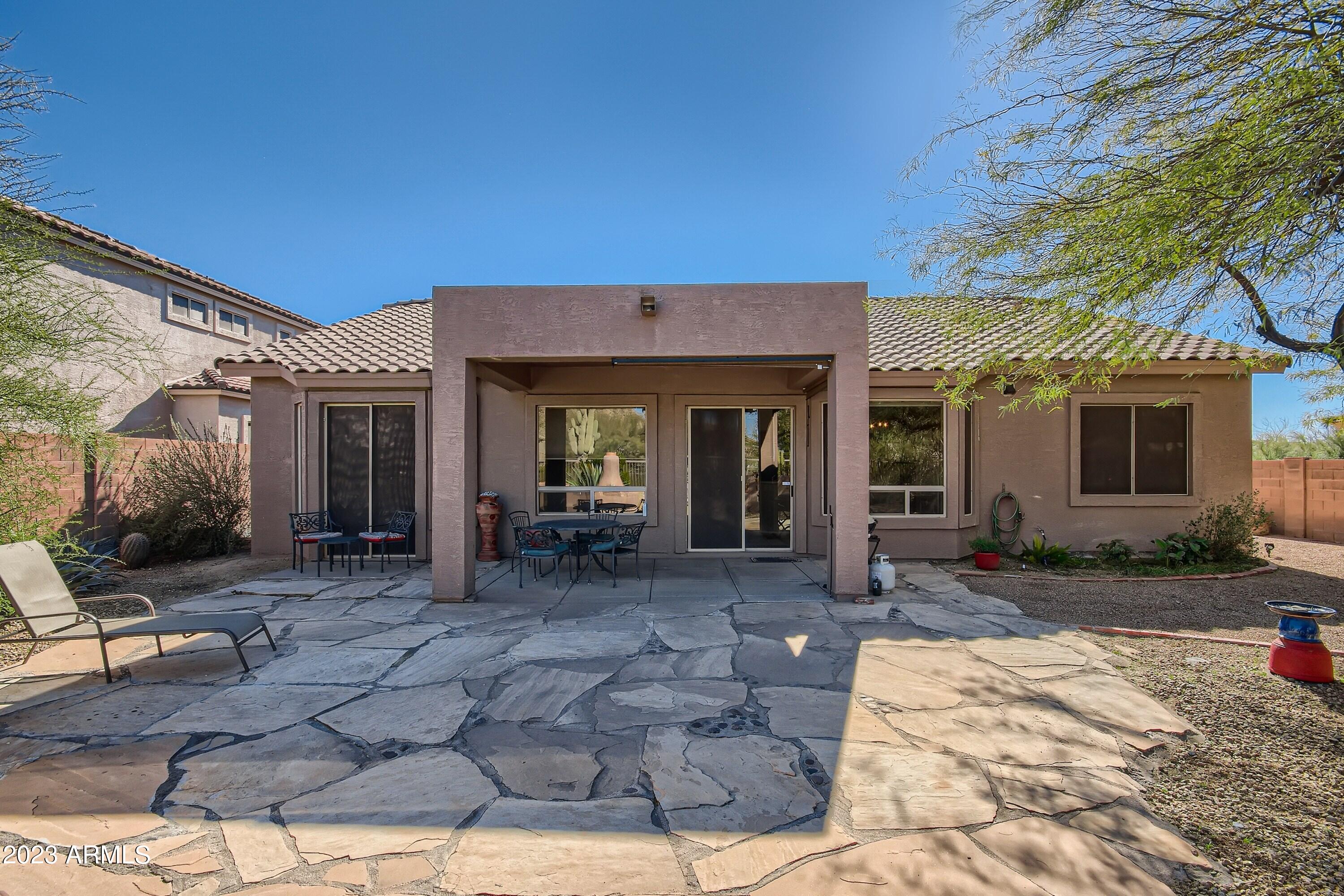 3060 North Ridgecrest, Unit 175 Mesa, AZ 85207 - Photo 28 of 28 a view of a house with backyard and sitting area