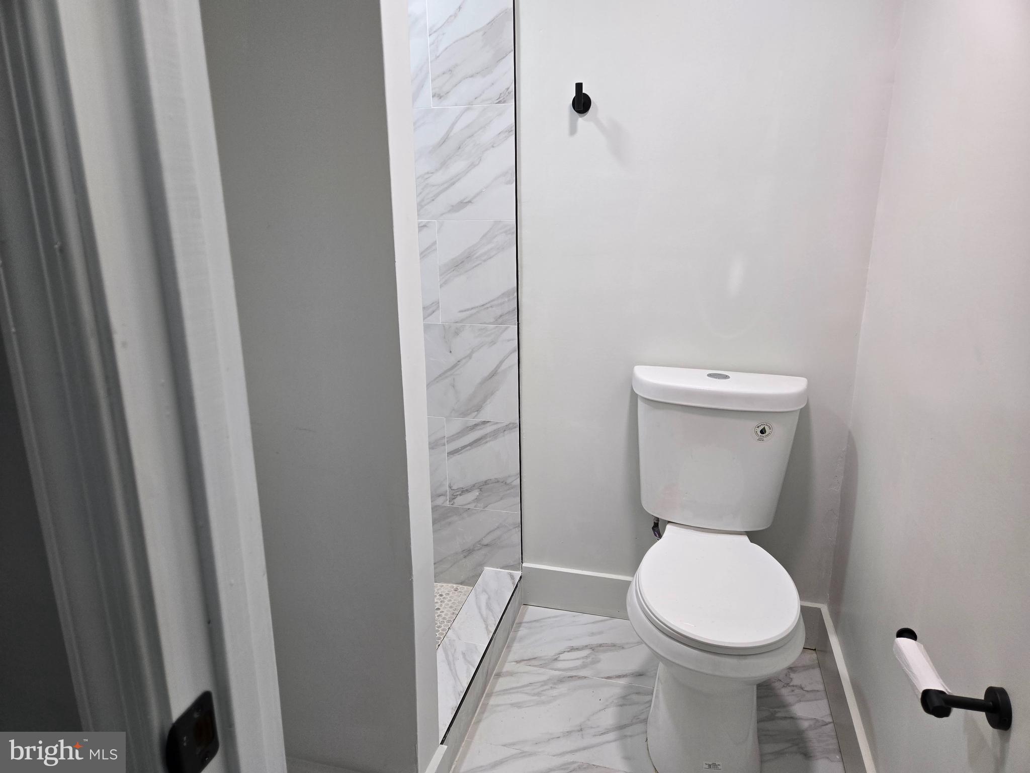 2811 East Preston Street Baltimore, MD 21213 - Photo 6 of 28 a bathroom with a toilet