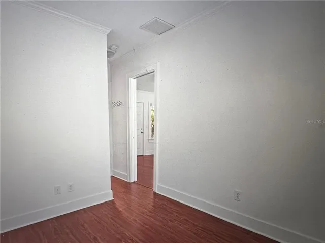 a view of a room with racks on the wall