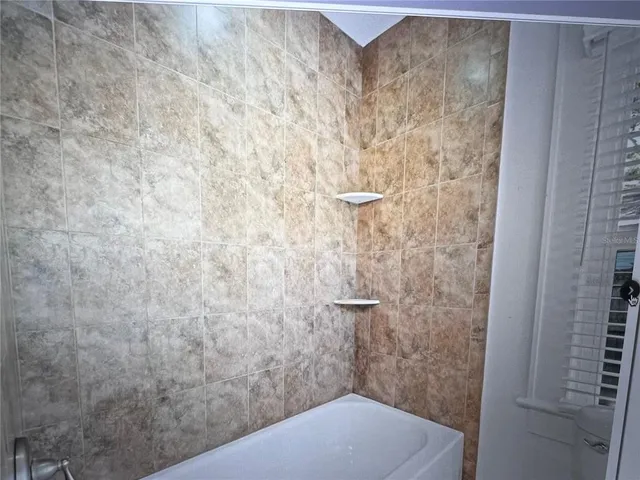 a view of a house with a big yard