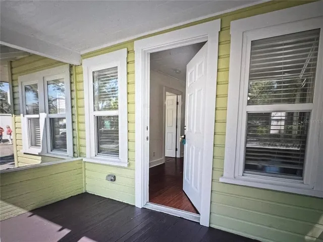 a room with window and stairs