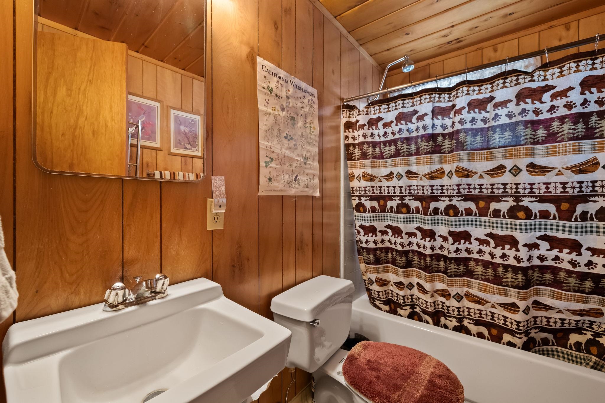 26039 Long Barn Road Long Barn, CA 95335 - Photo 17 of 27 a bathroom with a sink toilet and shower