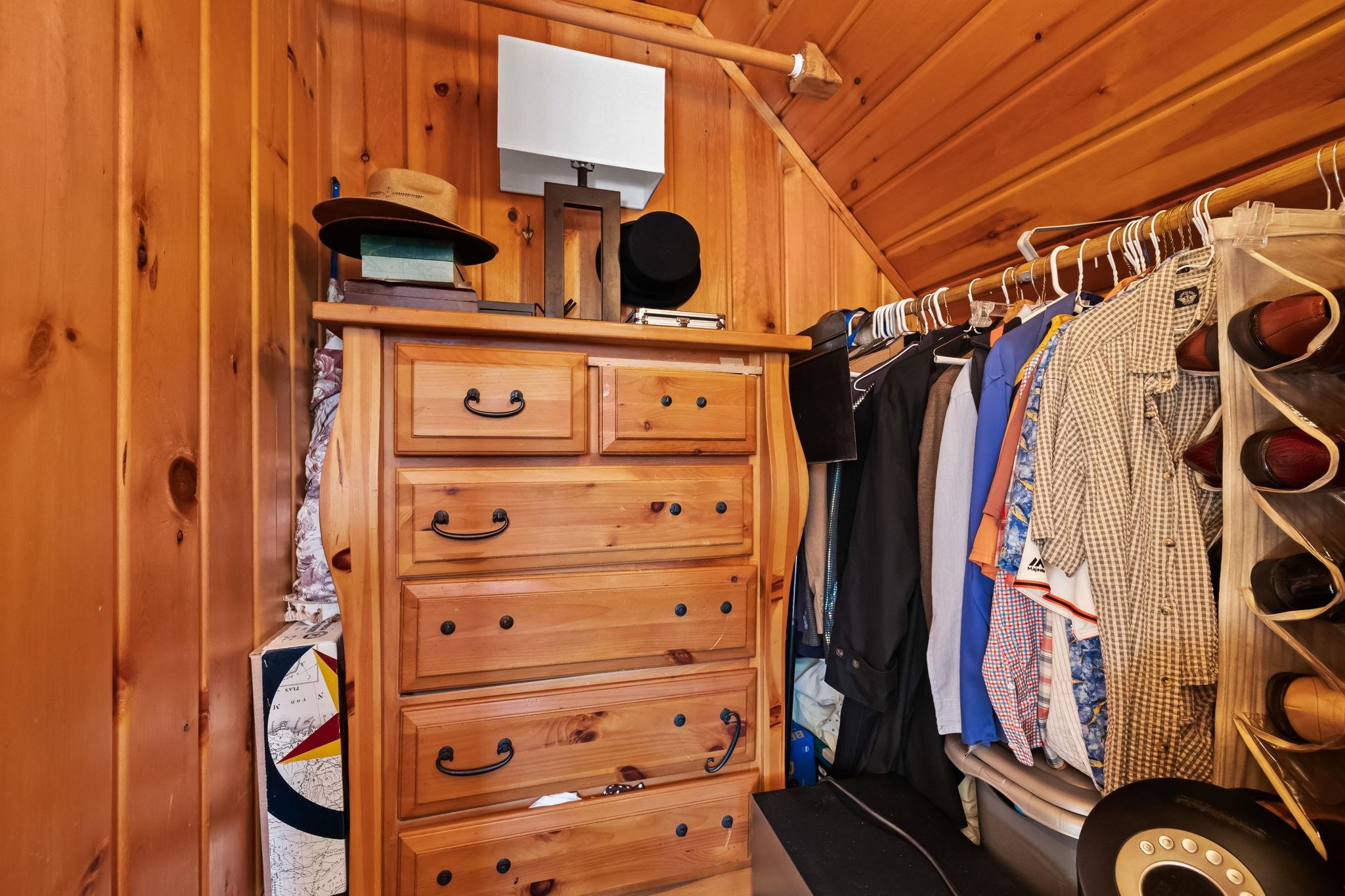 26039 Long Barn Road Long Barn, CA 95335 - Photo 24 of 27 a view of walk in closet with clothes