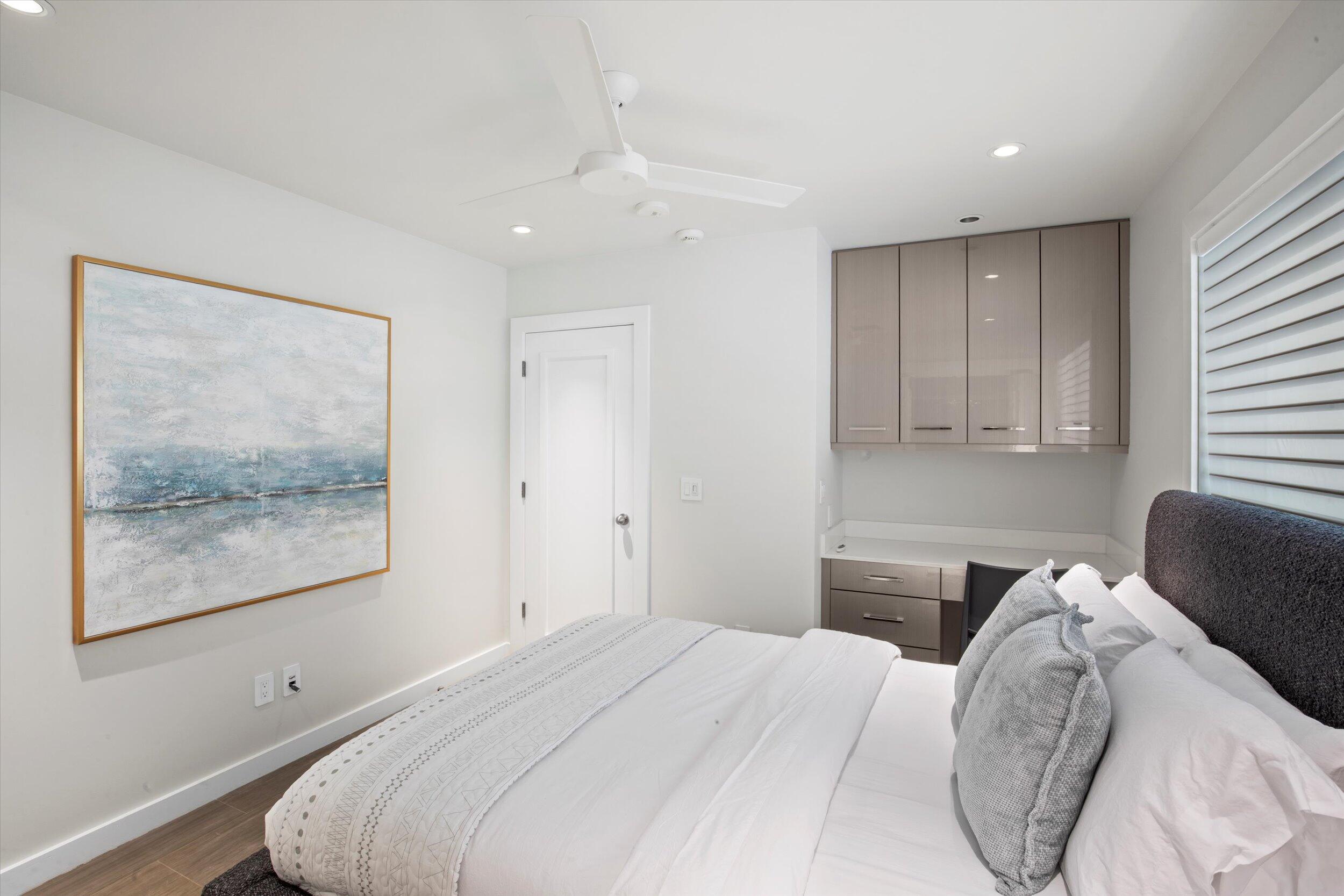 1501 Florida Street Key West, FL 33040 - Photo 61 of 70 a bedroom with a bed and a painting on the wall