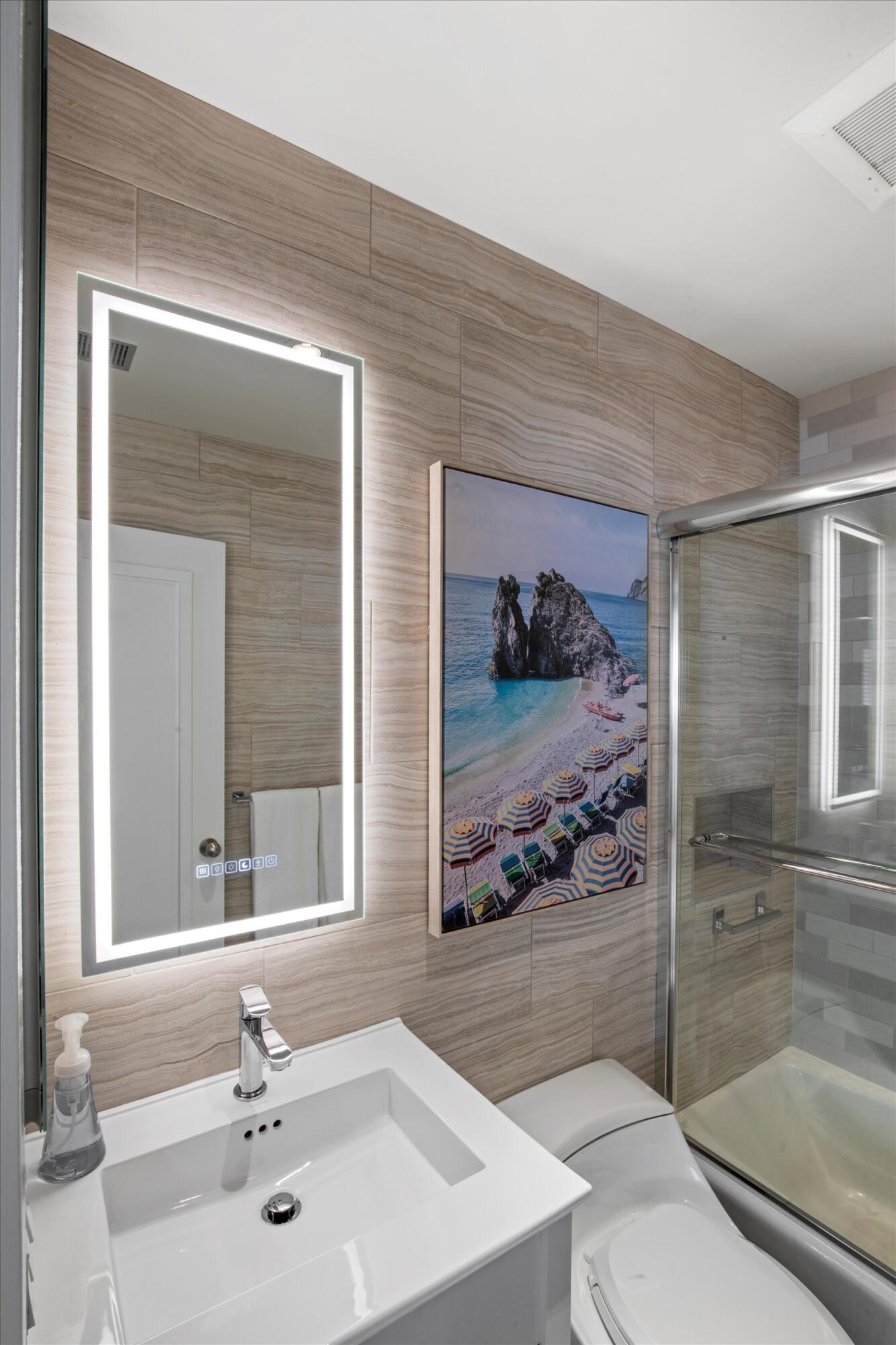 1501 Florida Street Key West, FL 33040 - Photo 62 of 70 a bathroom with a sink a toilet and shower