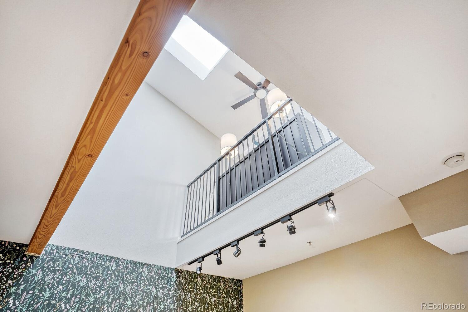 3295 Blake Street, Unit 202 Denver, CO 80205 - Photo 18 of 39 a view of staircase with white walls and white walls