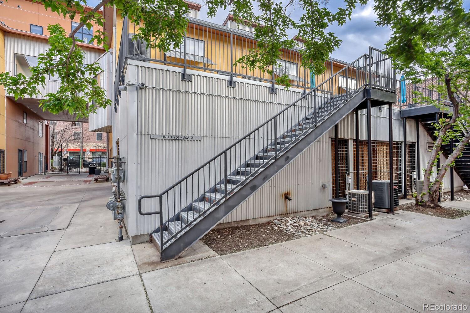 3295 Blake Street, Unit 202 Denver, CO 80205 - Photo 6 of 39 a view of entryway with a street