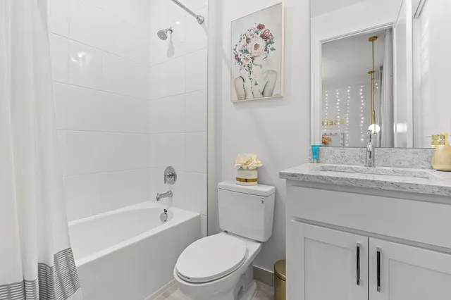 a view of a swimming pool with a yard and palm trees