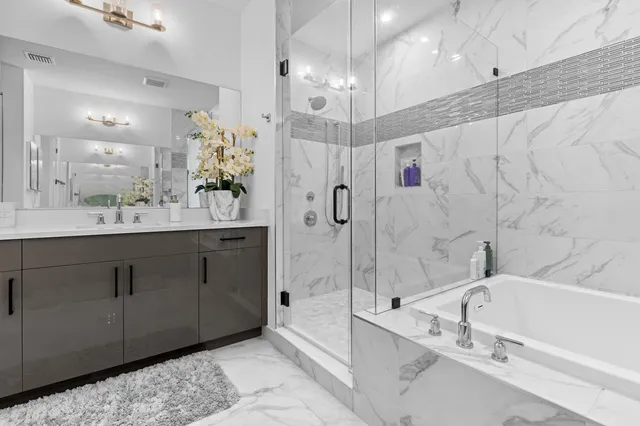 a view of a house with backyard porch and sitting area