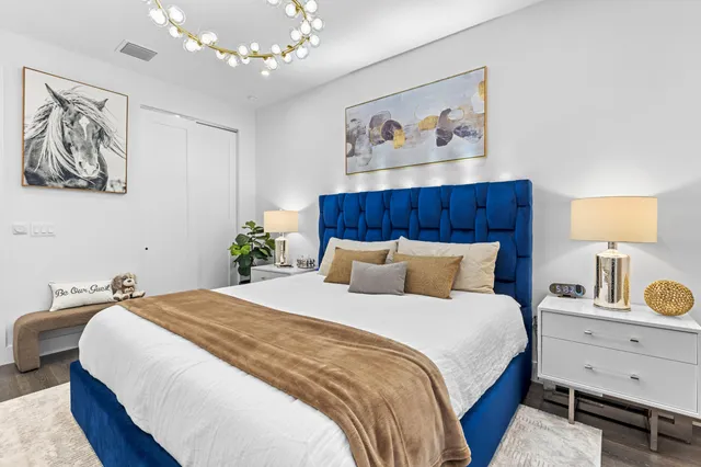 an aerial view of a houses with a lake view