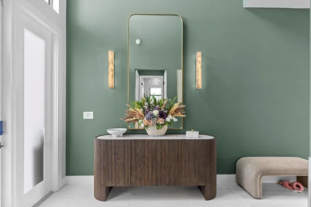 a kitchen with stainless steel appliances a microwave a stove and refrigerator