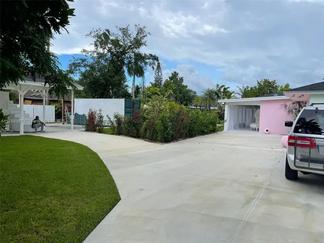 a house view with a garden space