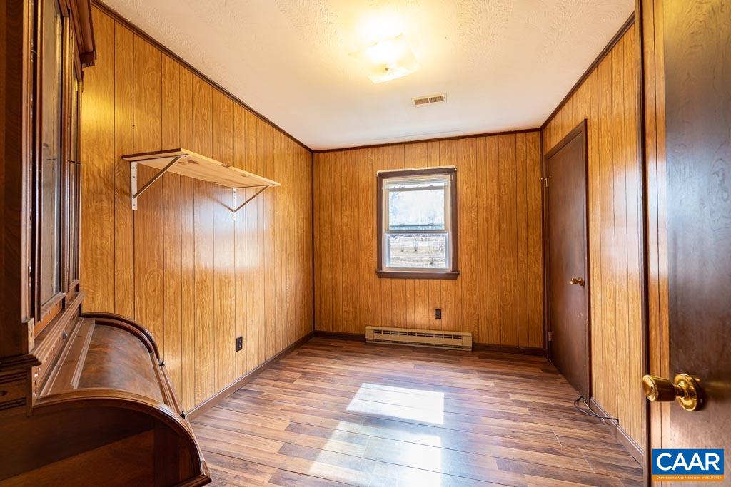 9 Old Durrette Road Stanardsville, VA 22973 - Photo 13 of 46 a view of a room with wooden floor and windows