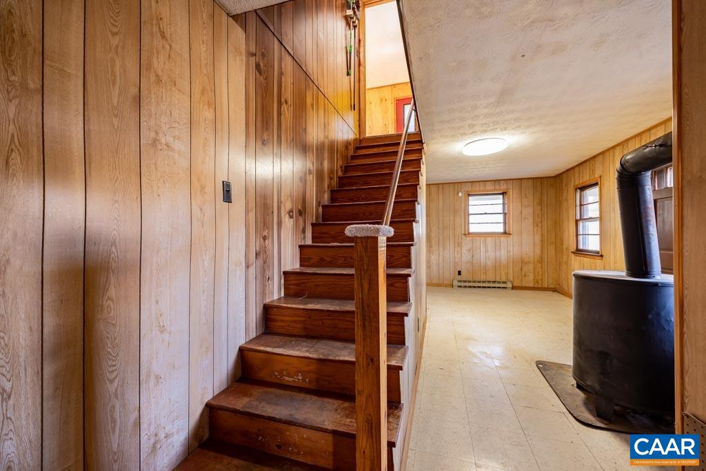 9 Old Durrette Road Stanardsville, VA 22973 - Photo 16 of 46 a view of an entryway with wooden floor and stairs