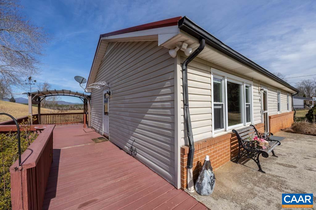 9 Old Durrette Road Stanardsville, VA 22973 - Photo 24 of 46 a view of a house with a patio
