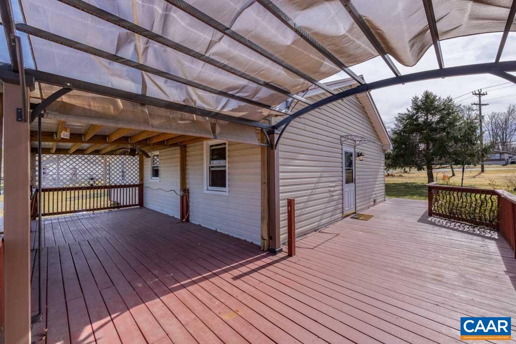 9 Old Durrette Road Stanardsville, VA 22973 - Photo 26 of 46 a view of a porch with wooden floor