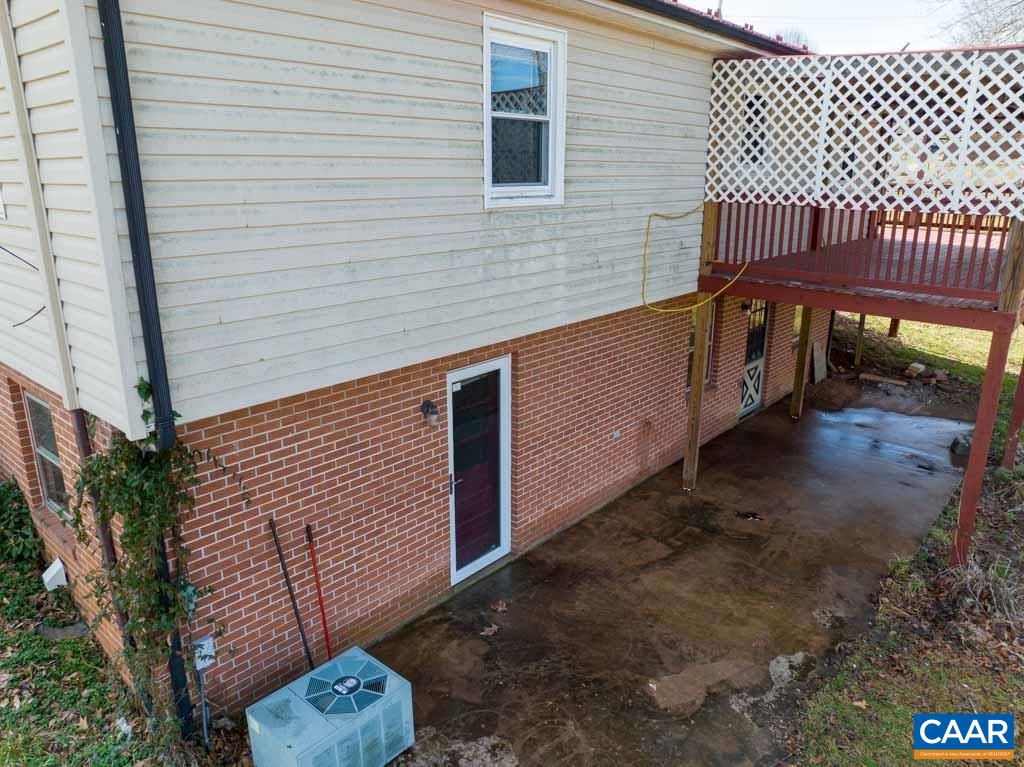 9 Old Durrette Road Stanardsville, VA 22973 - Photo 31 of 46 a view of a backyard with a deck