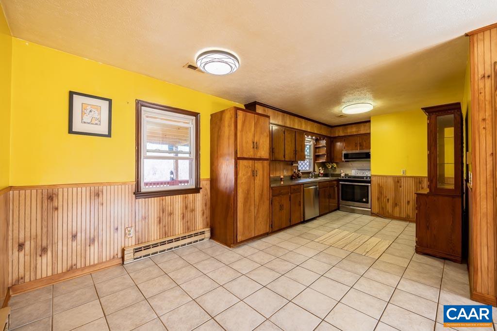 9 Old Durrette Road Stanardsville, VA 22973 - Photo 7 of 46 a kitchen with a refrigerator and a sink