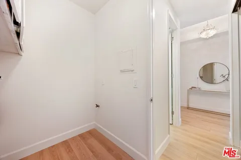 a view of a bathroom from a hallway