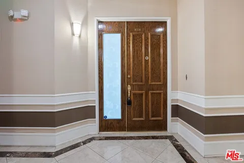 a bathroom with a tub and shower