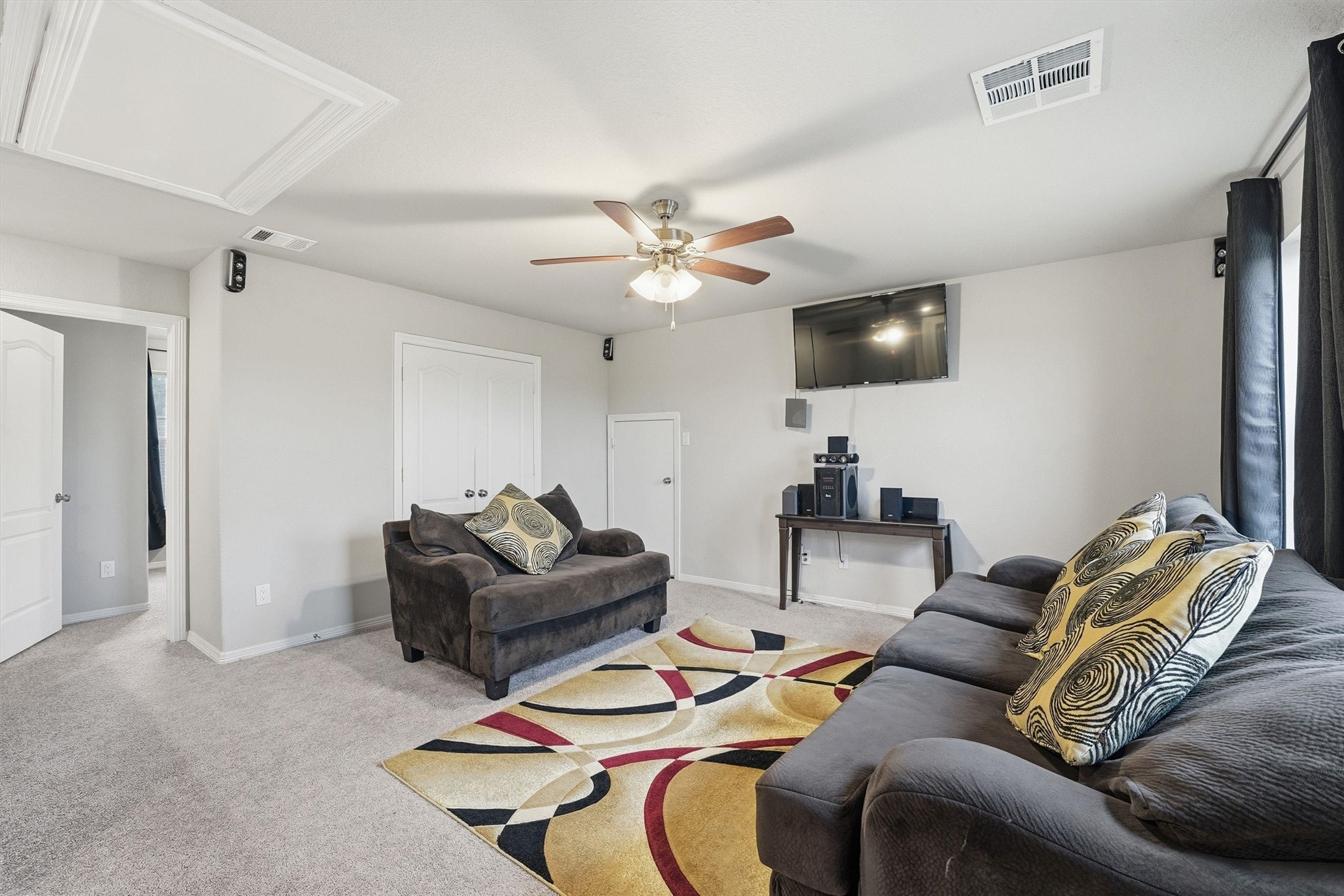 24818 Russet Bluff Trail Houston, TX 77336 - Photo 12 of 23 a living room with furniture and a flat screen tv