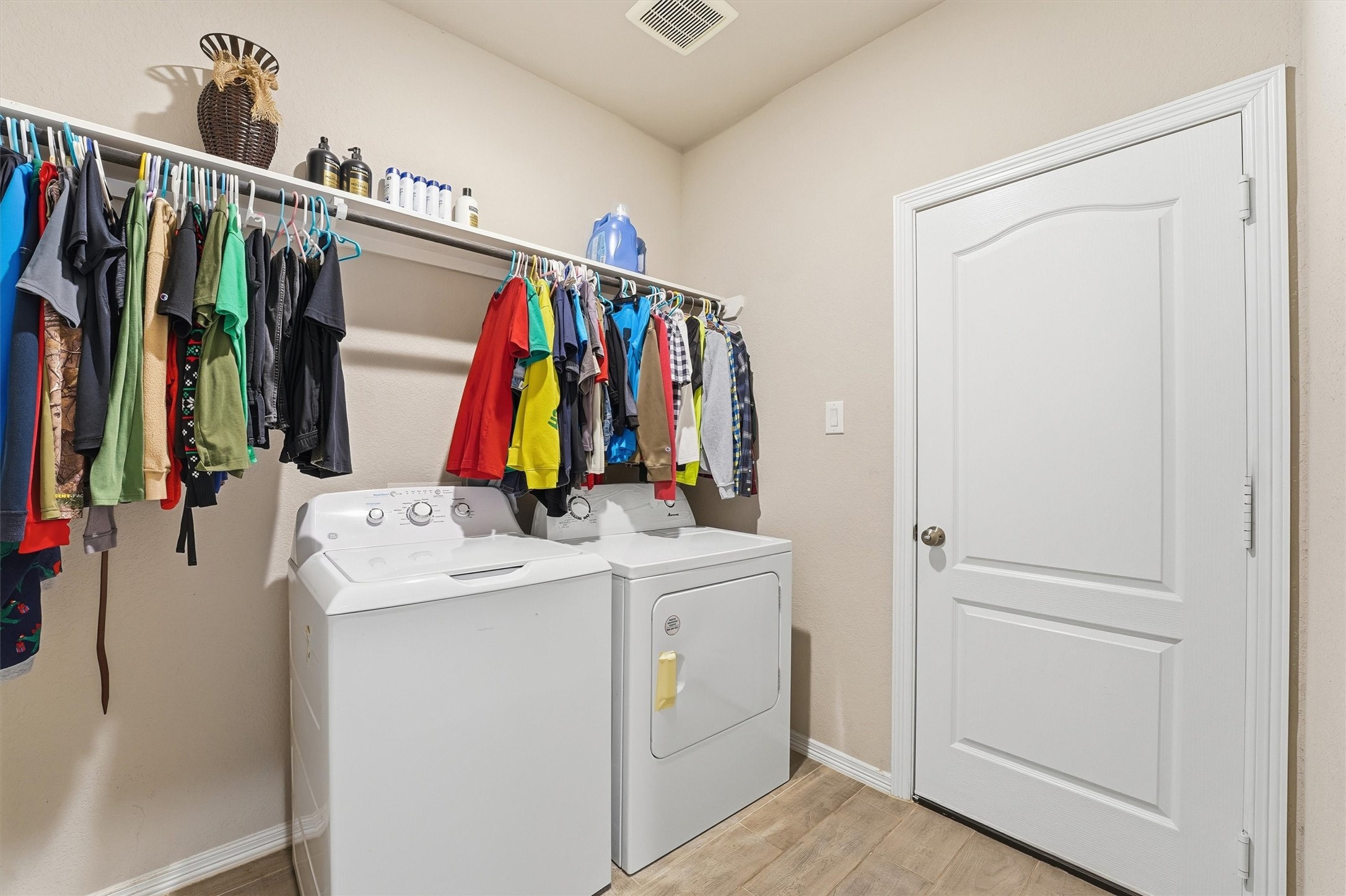 24818 Russet Bluff Trail Houston, TX 77336 - Photo 21 of 23 a view of walk in closet with clothes and shoes