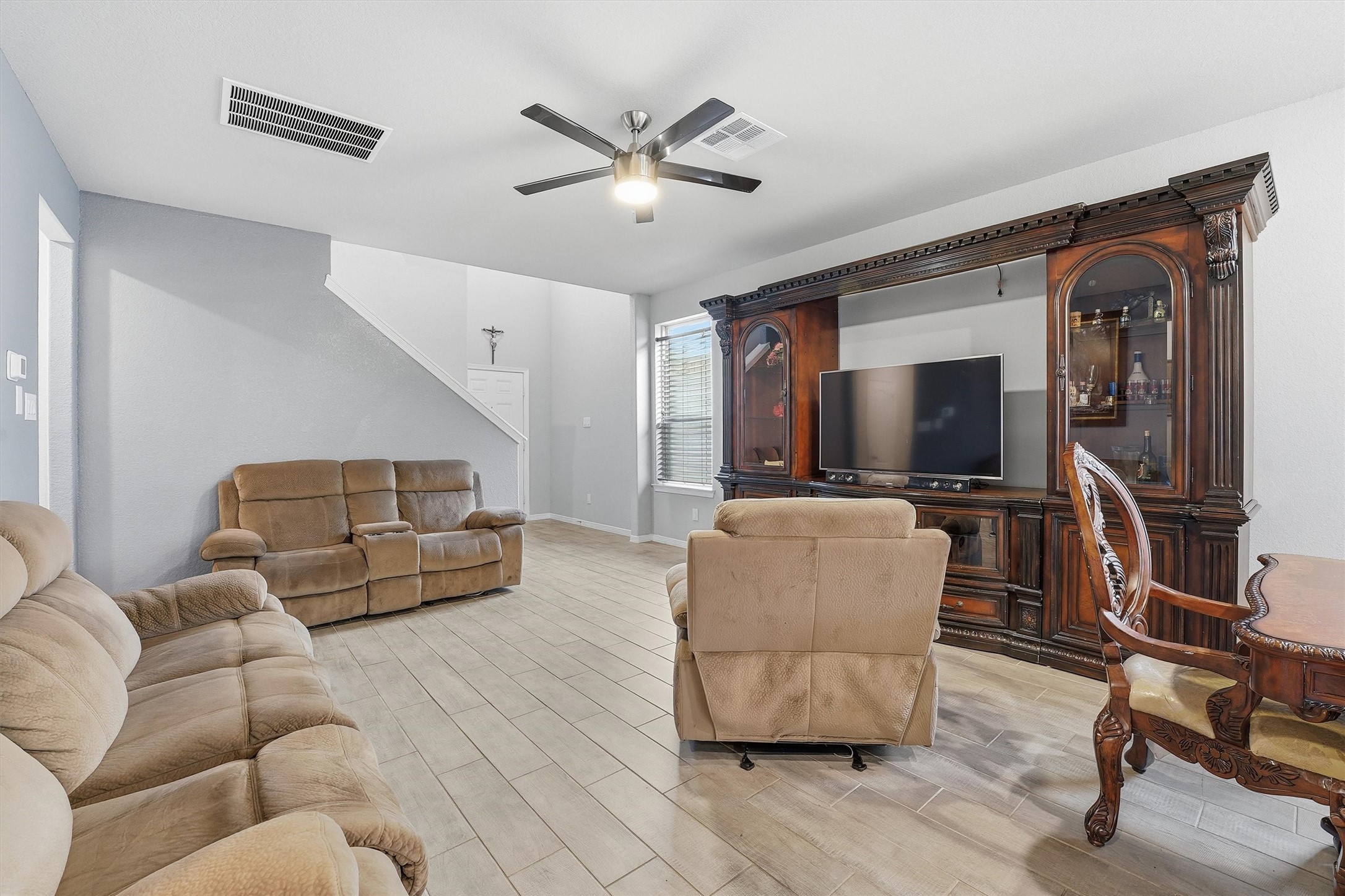 24818 Russet Bluff Trail Houston, TX 77336 - Photo 6 of 23 a living room with furniture and a flat screen tv