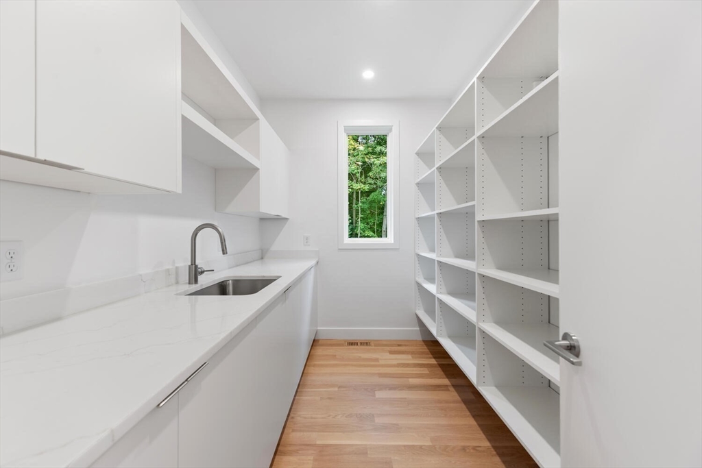 6 Linc Cole Lane Lexington, MA 02421 - Photo 13 of 30 a view of a kitchen with a sink and dishwasher