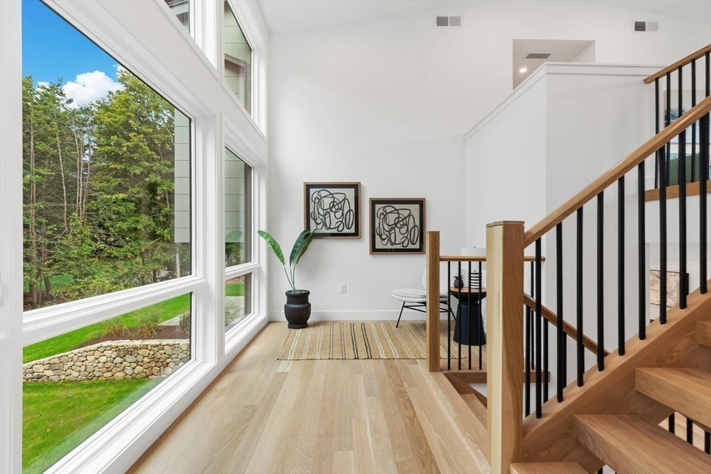 6 Linc Cole Lane Lexington, MA 02421 - Photo 15 of 30 a view of balcony with wooden floor and fence