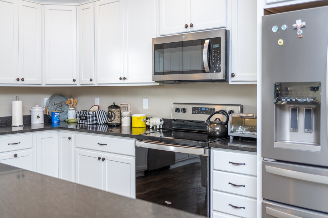 115 Ridgemore Drive Raphine, VA 24472 - Photo 15 of 42 a kitchen with stainless steel appliances granite countertop white cabinets and a stove