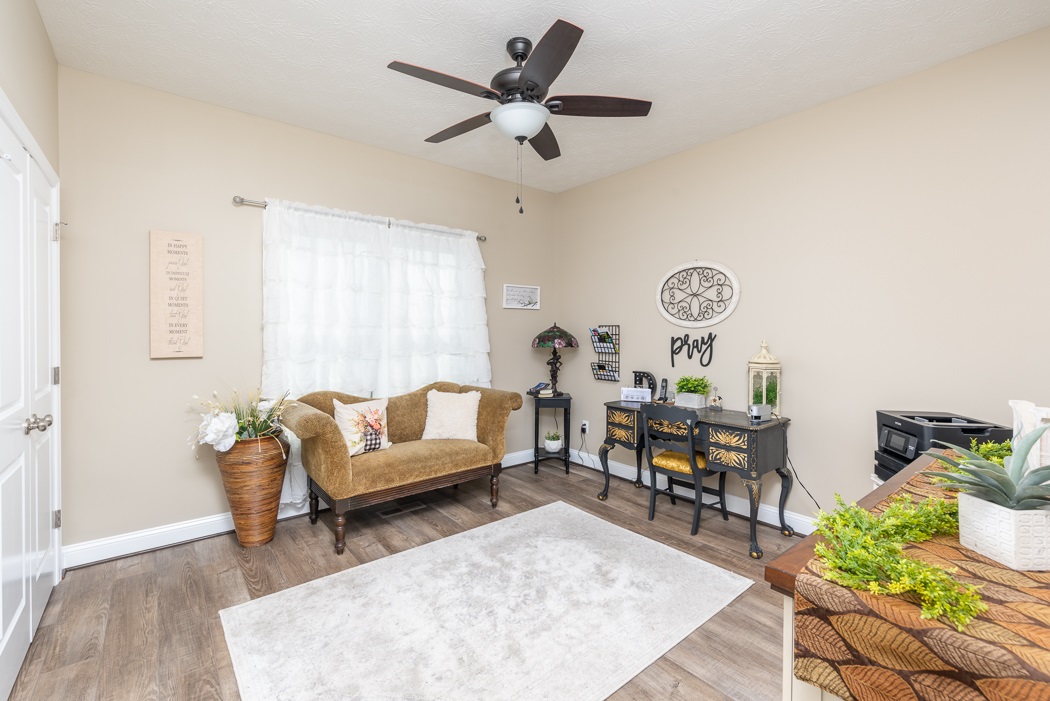 115 Ridgemore Drive Raphine, VA 24472 - Photo 27 of 42 a living room with furniture and a large window