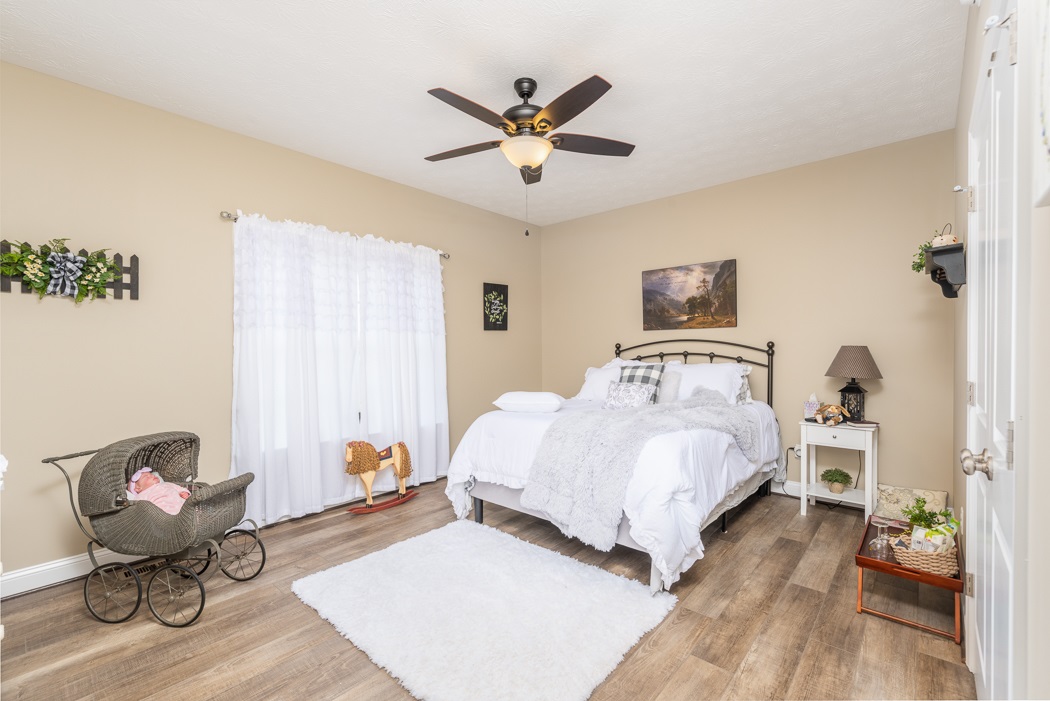 115 Ridgemore Drive Raphine, VA 24472 - Photo 29 of 42 a bedroom with a bed and window