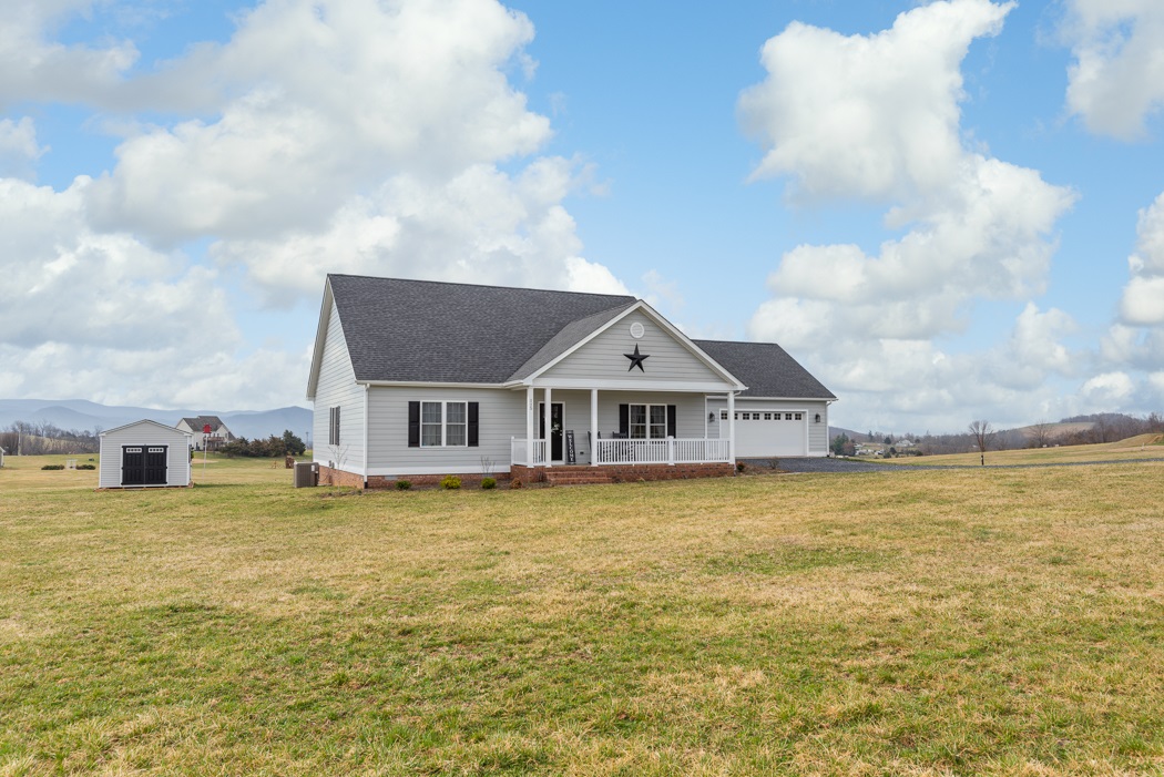 115 Ridgemore Drive Raphine, VA 24472 - Photo 3 of 42 a front view of a house with a large pool