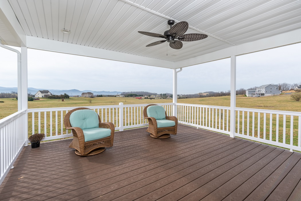 115 Ridgemore Drive Raphine, VA 24472 - Photo 32 of 42 a balcony with wooden floor outdoor seating and city view