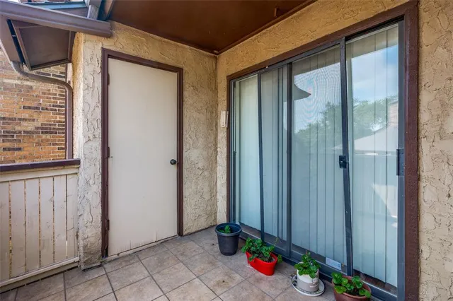 a view of a entryway door front of house
