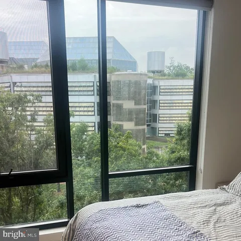 a kitchen with a sink a stove a refrigerator and cabinets
