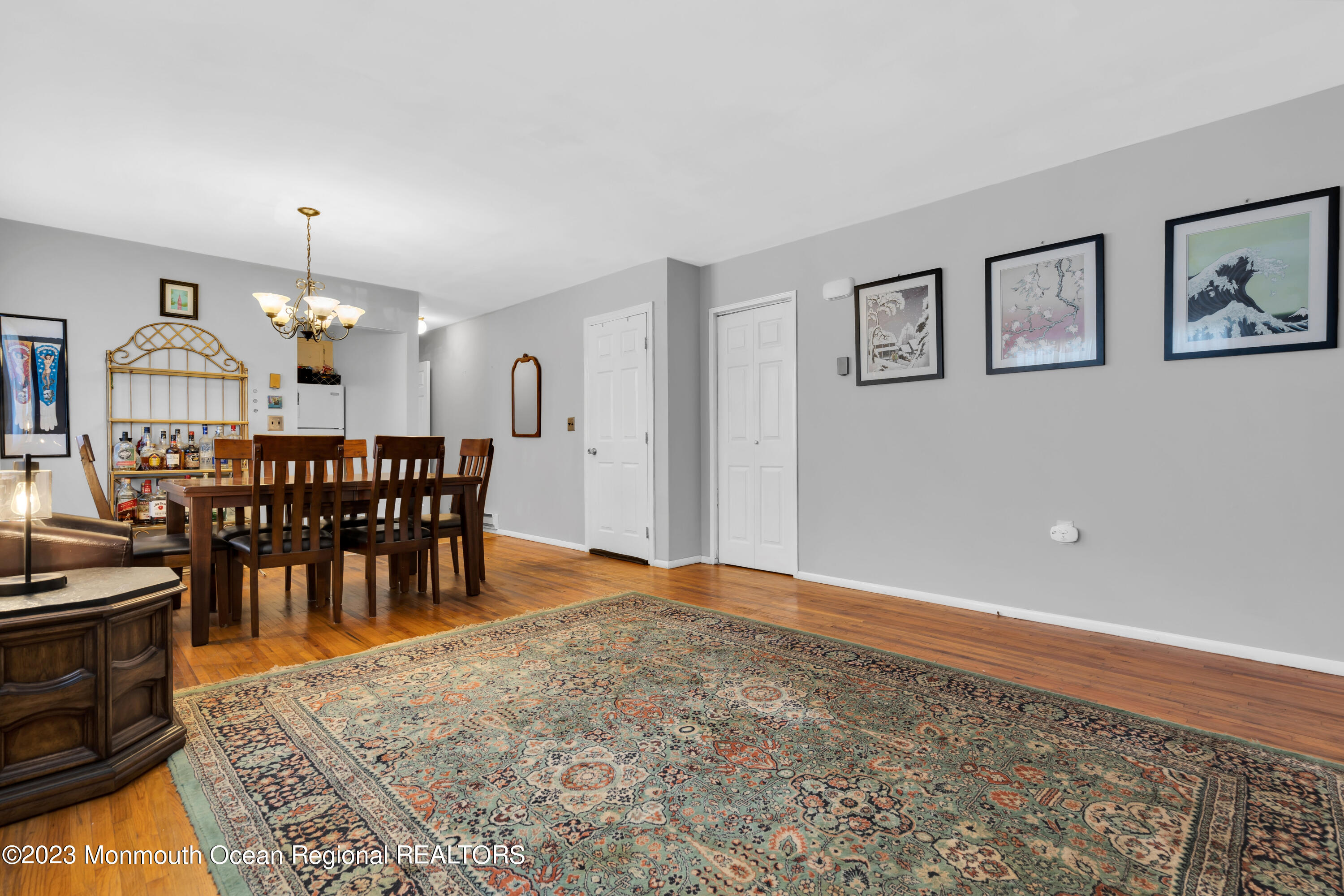 142 Azalea Drive, Unit B Whiting, NJ 08759 - Photo 11 of 27 a view of a livingroom with furniture and chandelier