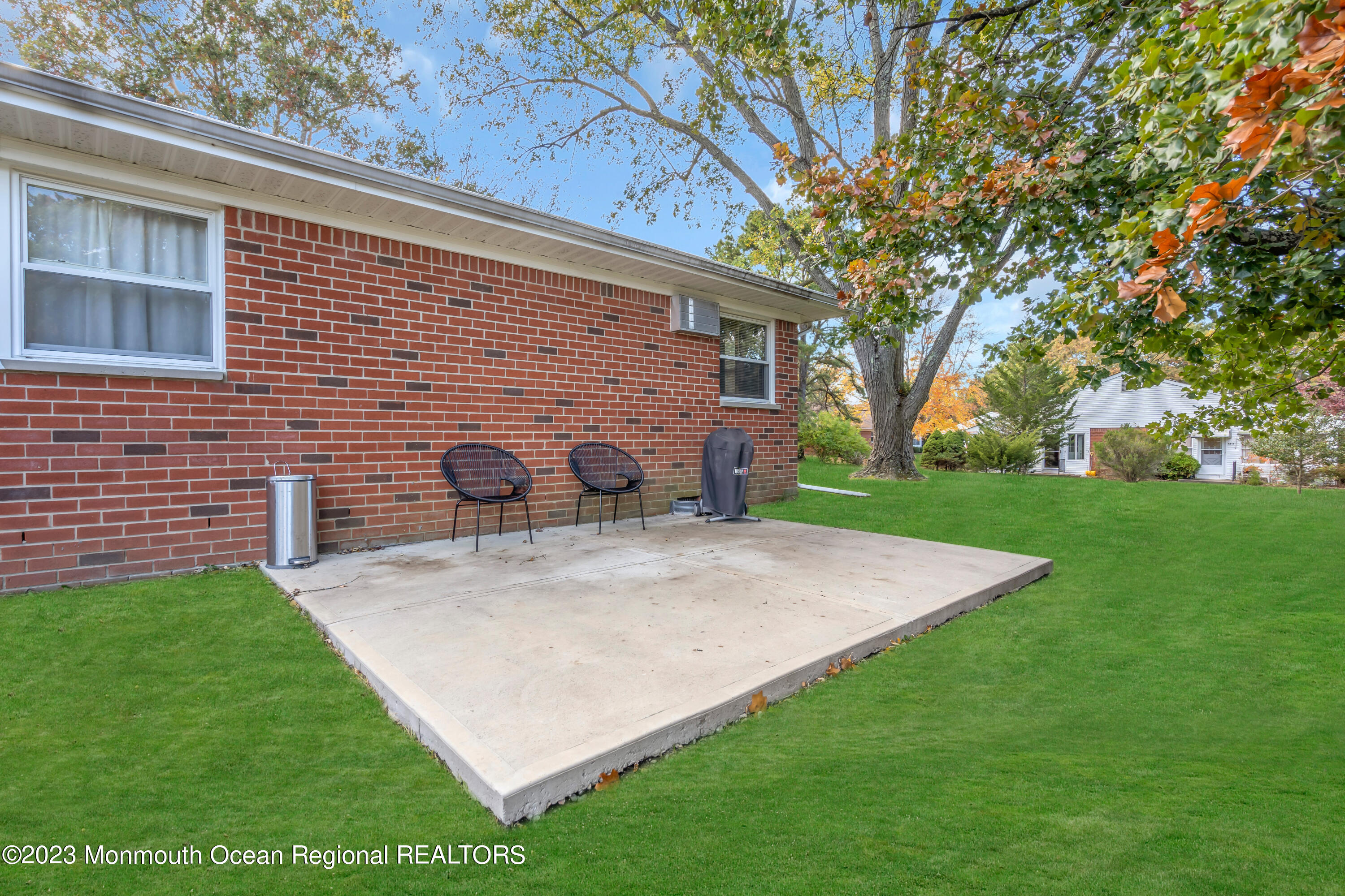 142 Azalea Drive, Unit B Whiting, NJ 08759 - Photo 24 of 27 a view of a backyard with a garden