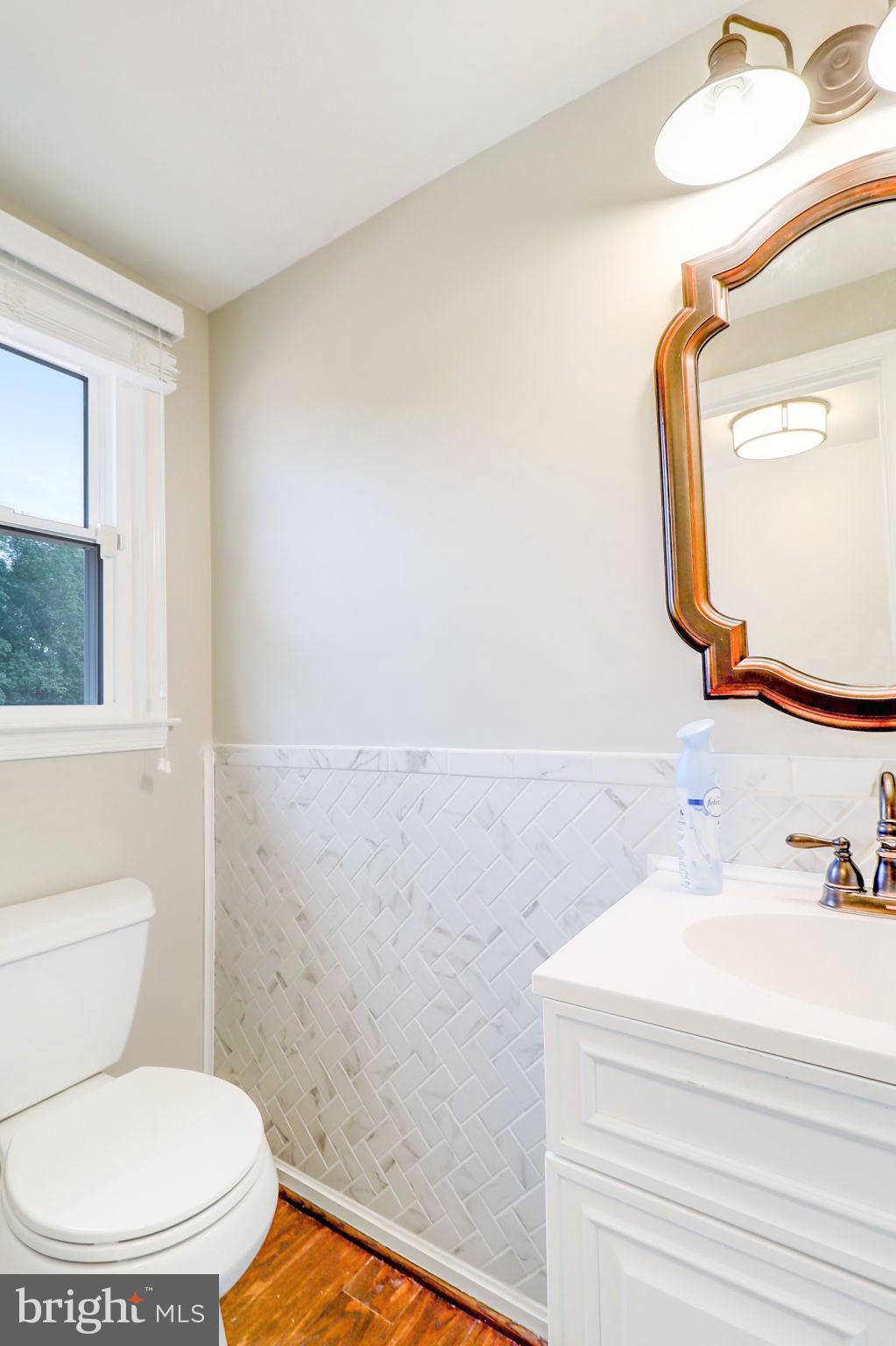 21960 Oatlands Road Aldie, VA 20105 - Photo 45 of 79 a bathroom with a toilet and a sink