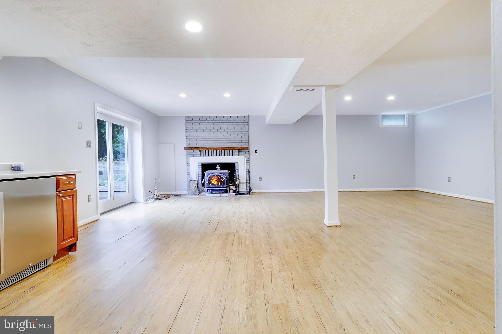 21960 Oatlands Road Aldie, VA 20105 - Photo 51 of 79 a view of empty room with a fireplace