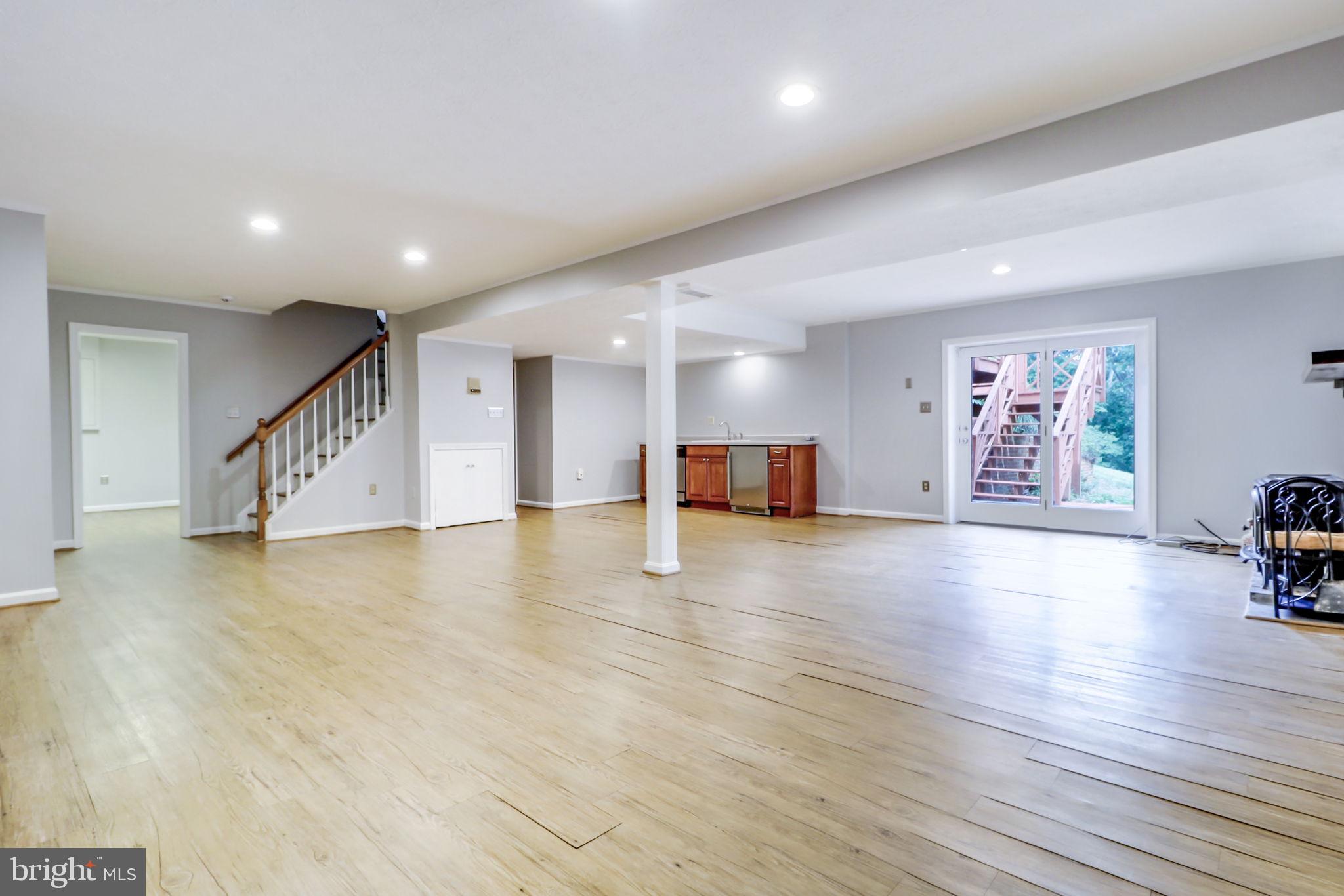 21960 Oatlands Road Aldie, VA 20105 - Photo 52 of 79 a view of empty room with wooden floor