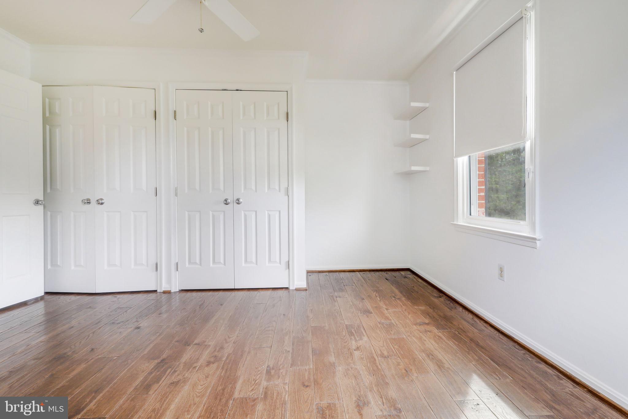 21960 Oatlands Road Aldie, VA 20105 - Photo 57 of 79 a view of an empty room with wooden floor