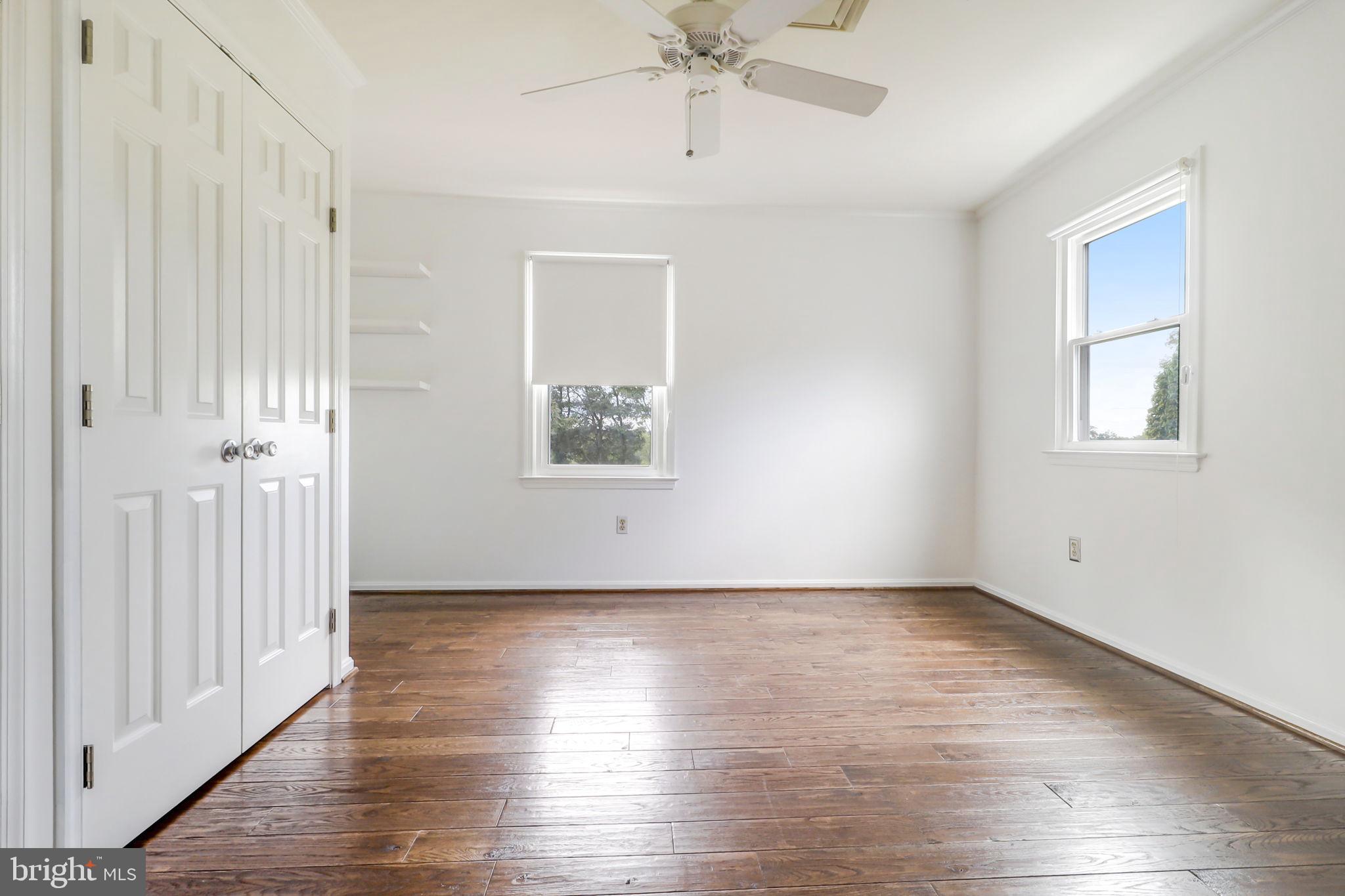 21960 Oatlands Road Aldie, VA 20105 - Photo 58 of 79 wooden floor in an empty room with a window