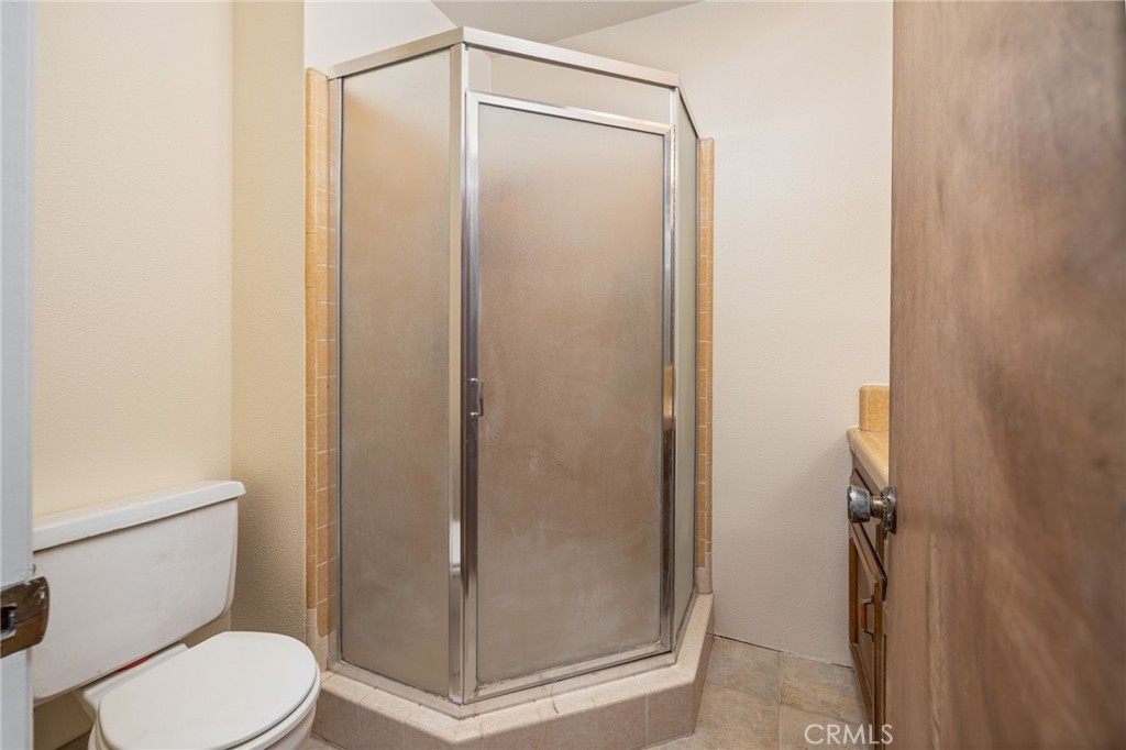 32413 Chickasaw Road Coarsegold, CA 93614 - Photo 13 of 66 a bathroom with a toilet and a shower