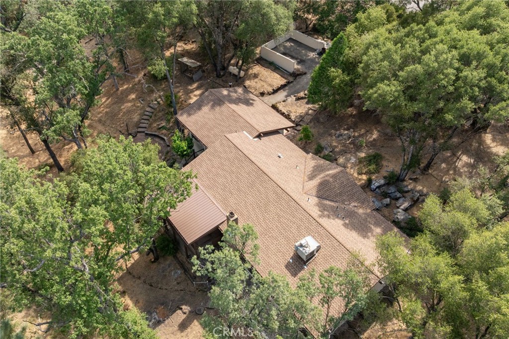 32413 Chickasaw Road Coarsegold, CA 93614 - Photo 35 of 66 an aerial view of a house with a yard and trees