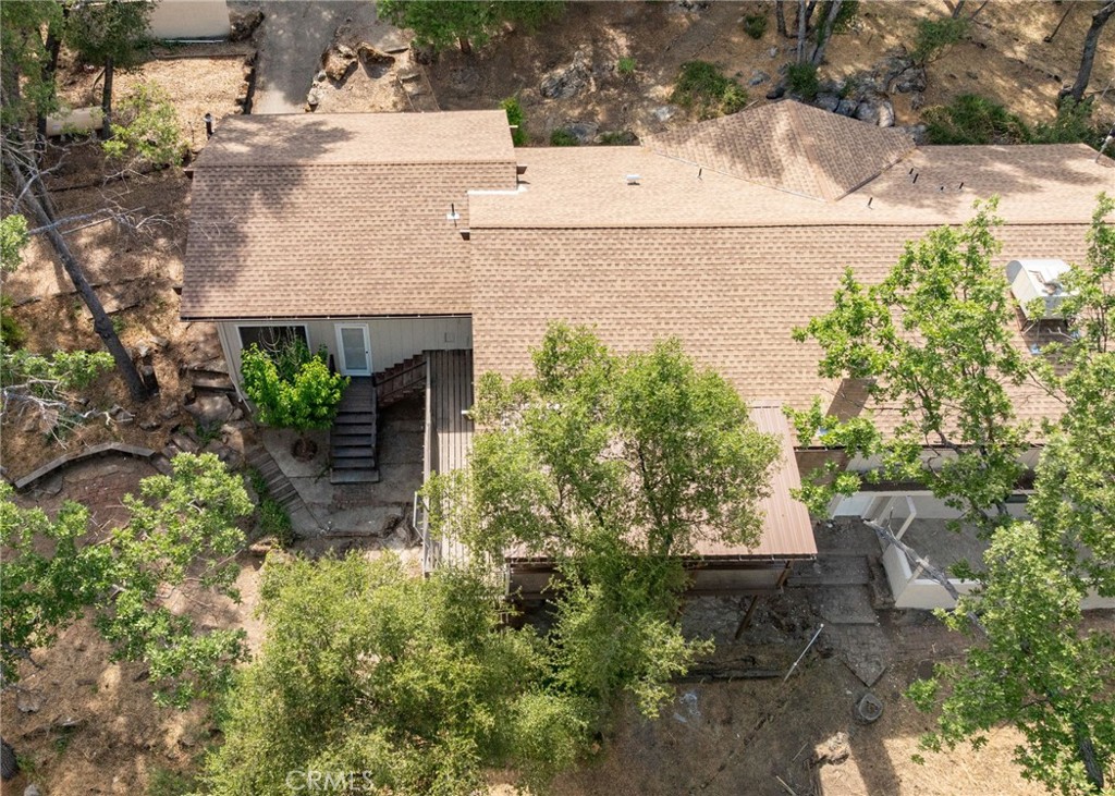 32413 Chickasaw Road Coarsegold, CA 93614 - Photo 36 of 66 a view of backyard with plants and outdoor seating
