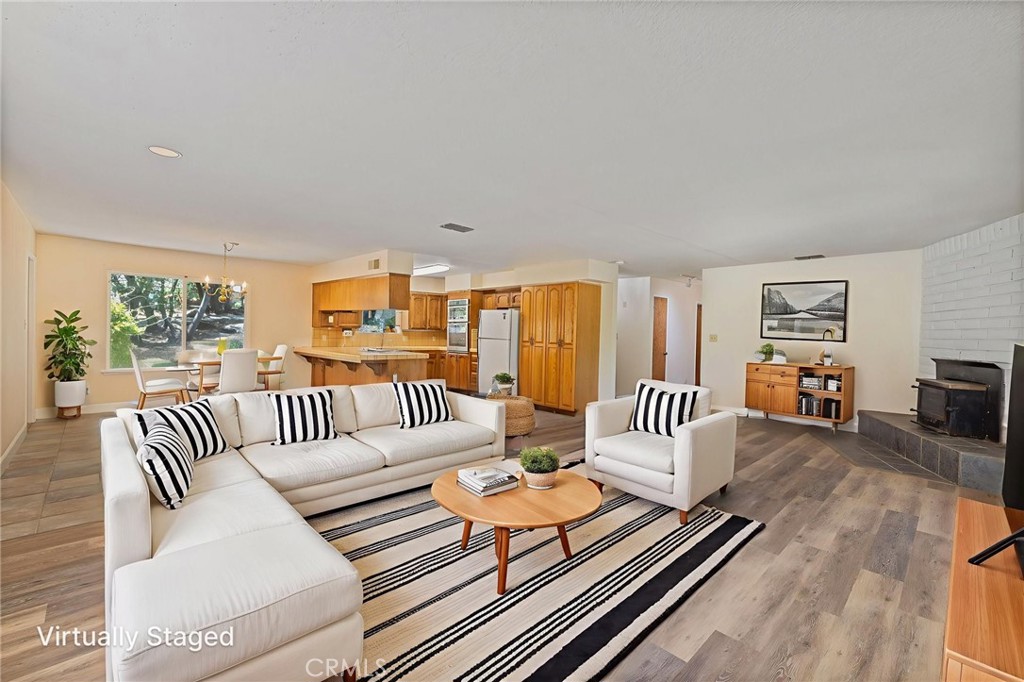 32413 Chickasaw Road Coarsegold, CA 93614 - Photo 5 of 66 a living room with furniture and a table